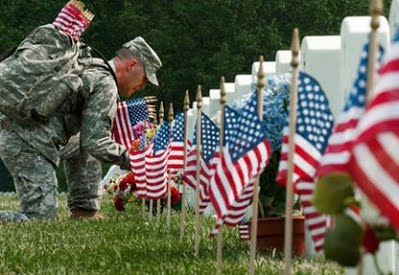 memorial day soilder with flag